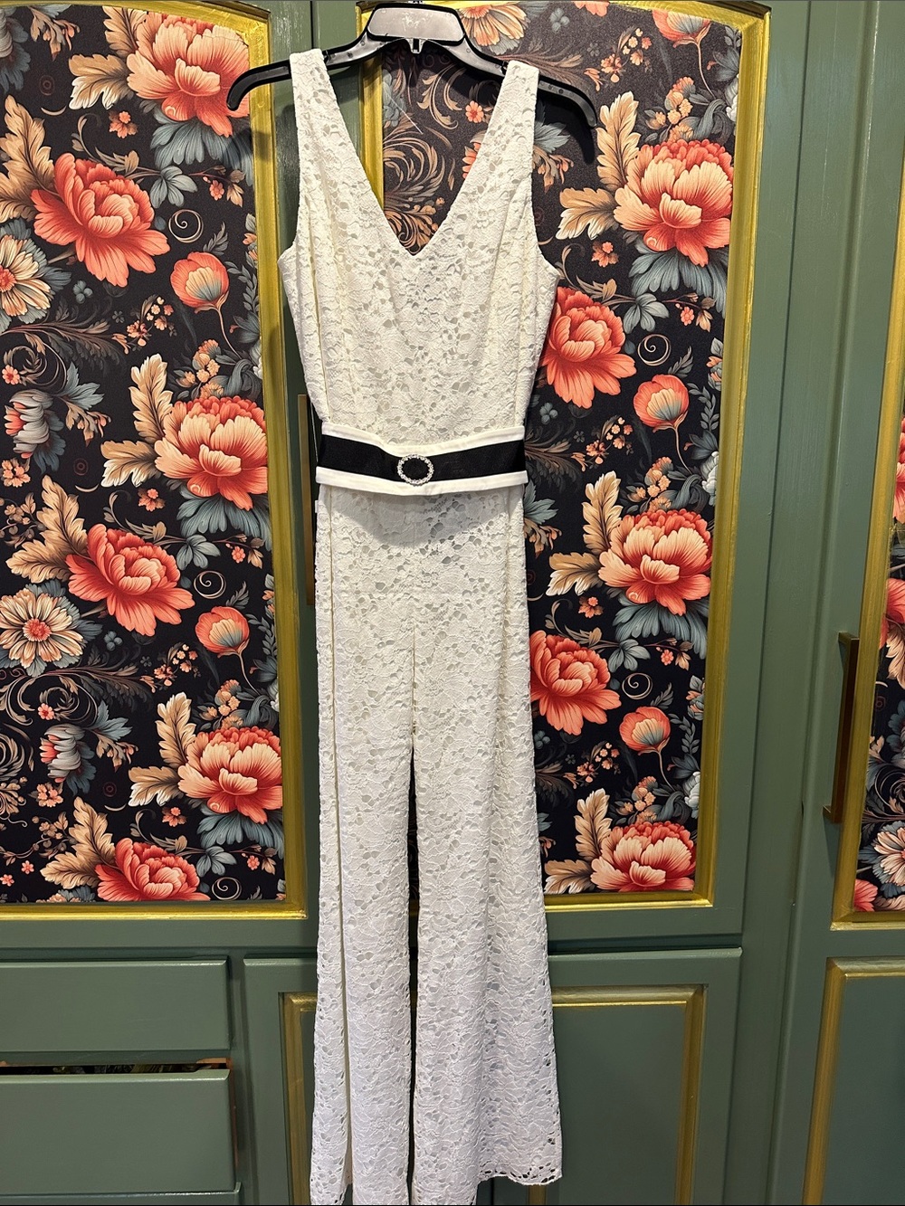 White Lace V-Neck Sleeveless Jumpsuit with Black Rhinestone Belt Detail